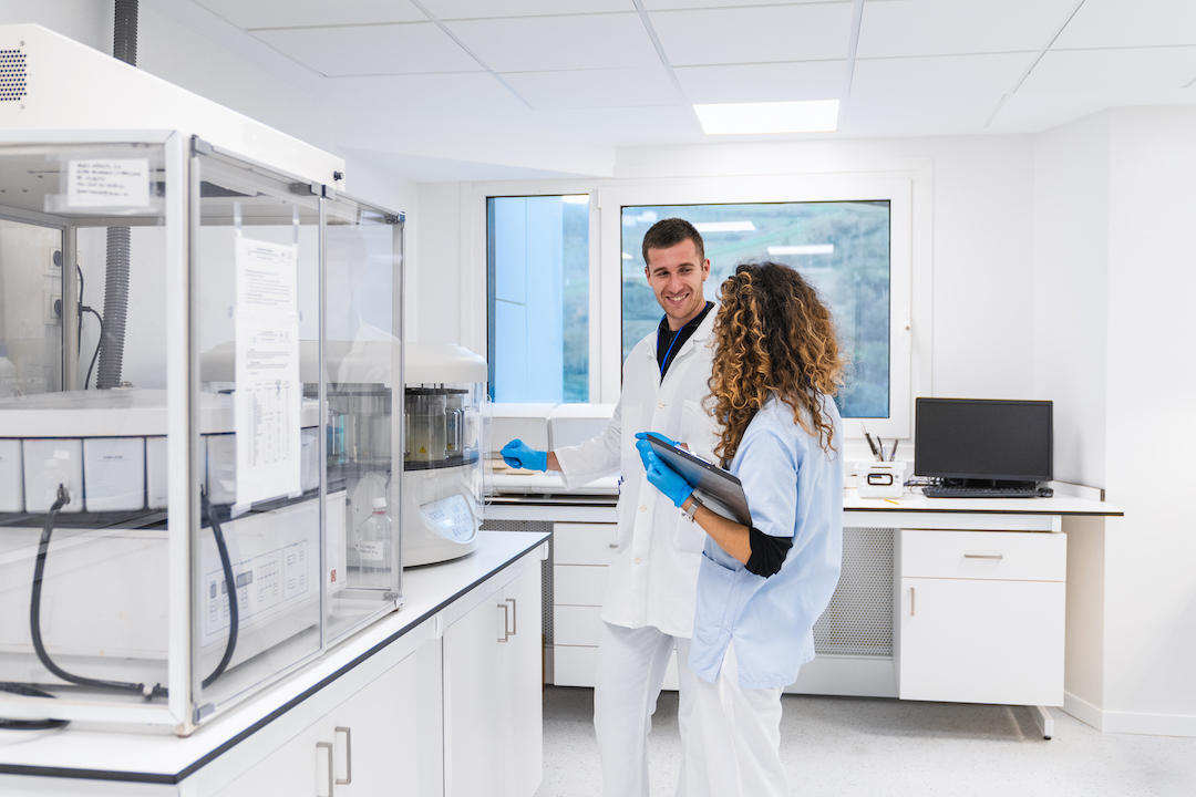 smiling-medical-staff-evaluating-data-in-a-hospital